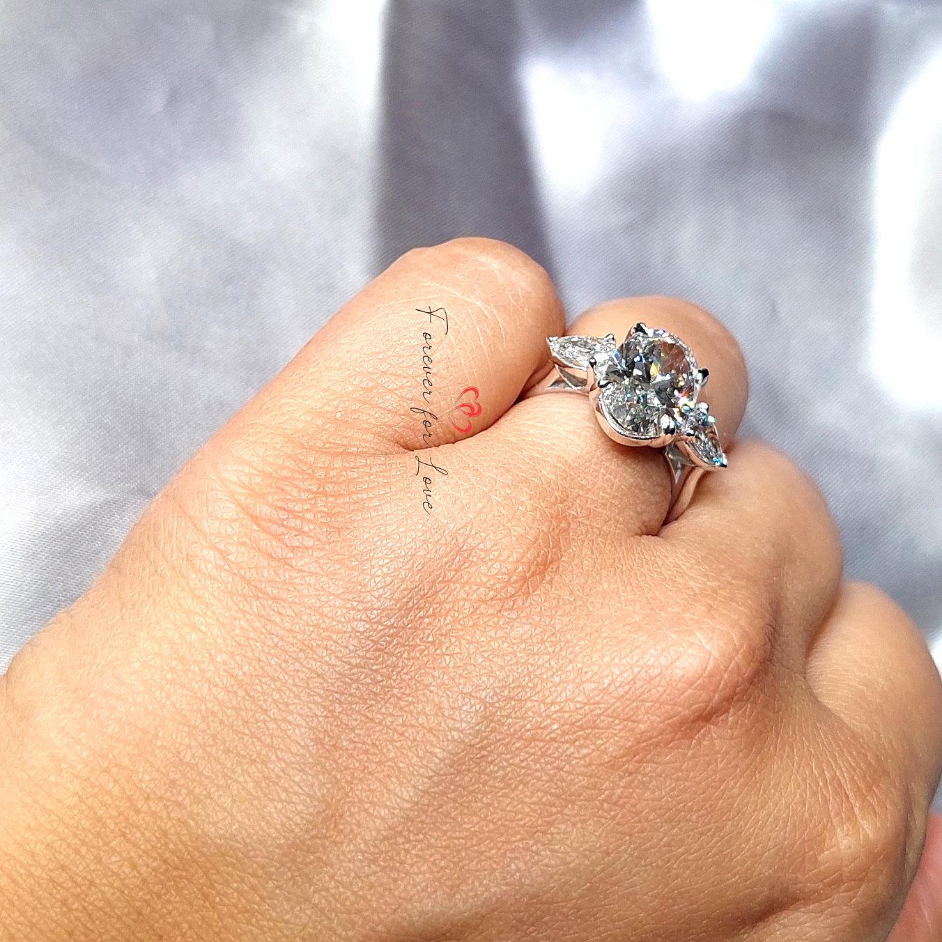 4 Ct IGI Certified Oval Lab Diamond Three Stone Engagement Ring