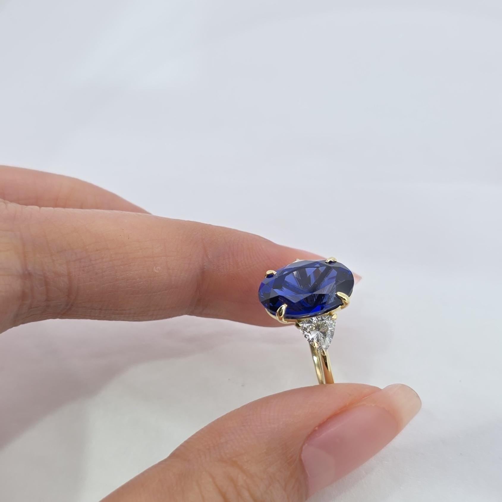 Oval Blue Diamond, Sapphire Hidden Halo Engagement Ring