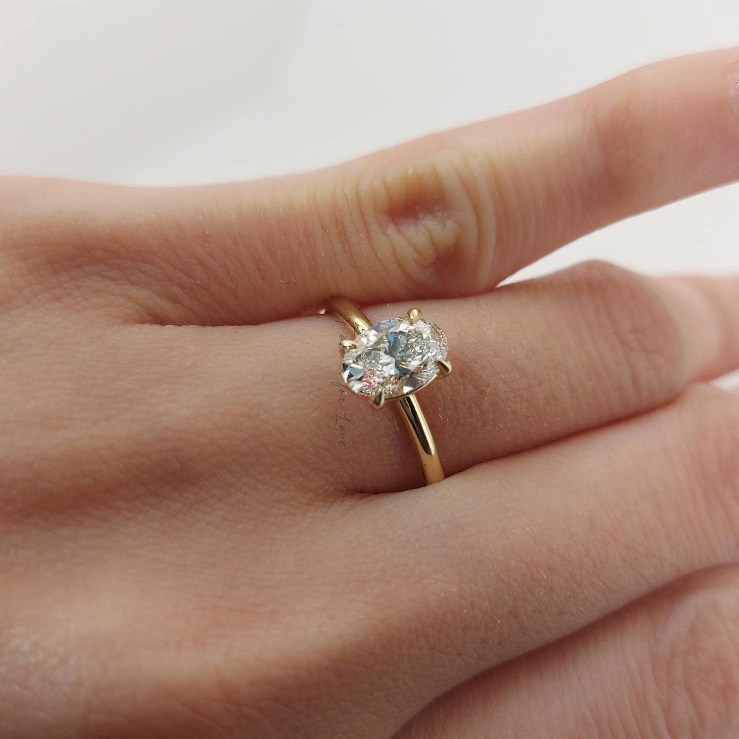 Bague de Fiançailles Solitaire Ovale en Diamant de Laboratoire 1 Ct D VVS2 Oval cut 1Ct Moissanite taille brillant engagement ring in Gold or Platinum — custom handcrafted by Forever For Love
