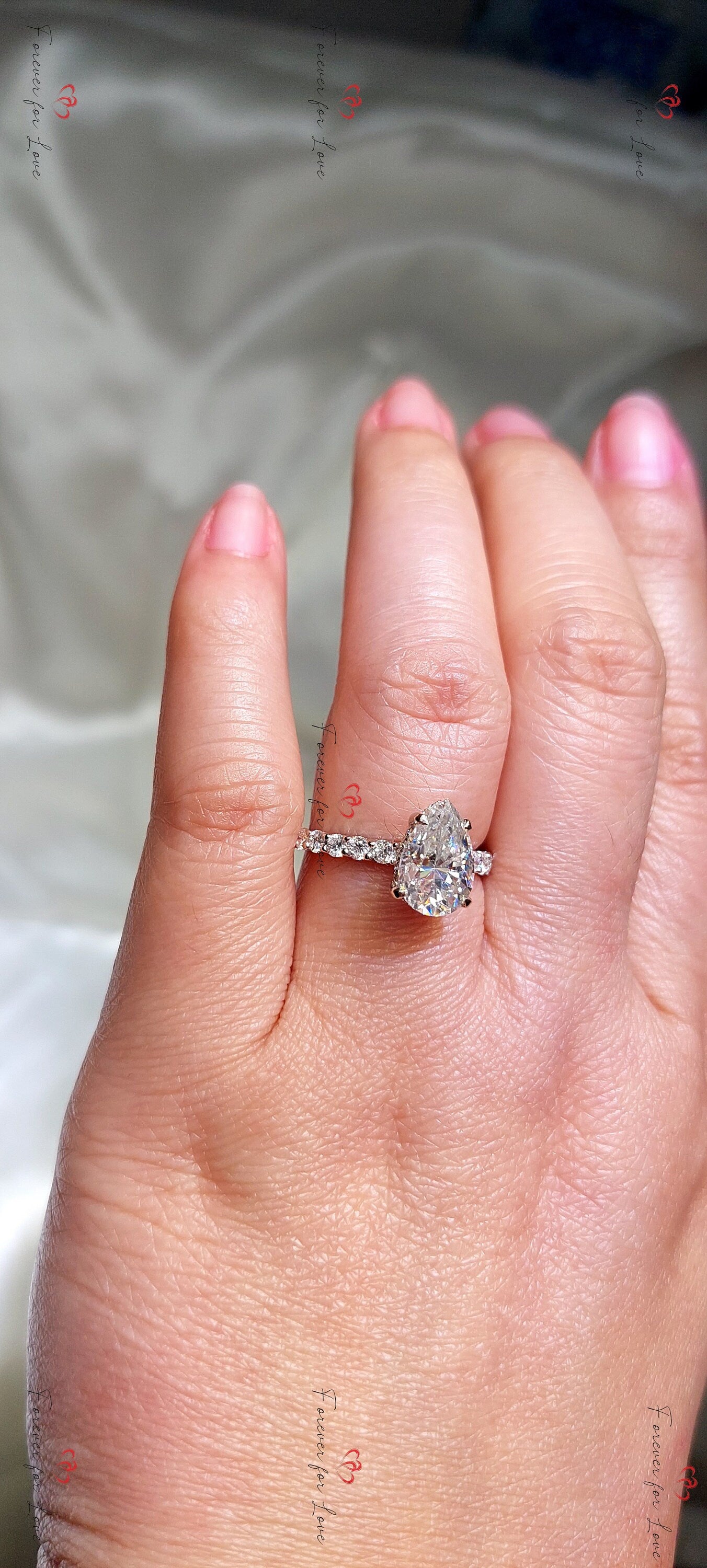2 Ct Pear Moissanite Pavé Eternity Engagement Ring Pear cut 1Ct Moissanite Brilliant Cut engagement ring in 935 Argentium Silver — custom handcrafted by Forever For Love