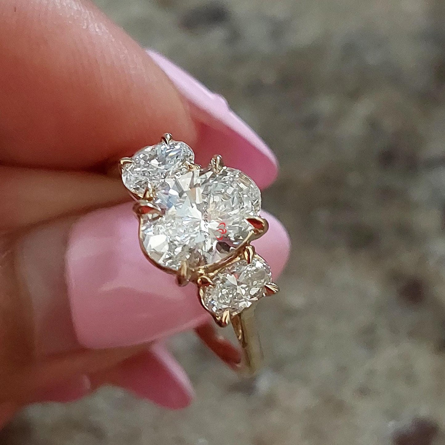 Bague d'anniversaire ovale à trois pierres certifiée IGI de 2 carats Oval cut Moissanite engagement ring in Gold or Platinum — custom handcrafted by Forever For Love