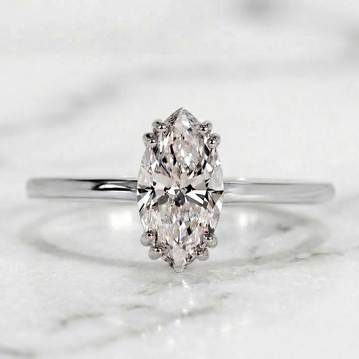 Bague de fiançailles solitaire marquise en diamant de laboratoire Marquise cut 1Ct Moissanite taille brillant engagement ring in Gold or Platinum — custom handcrafted by Forever For Love