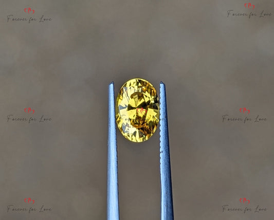 A natural, elegant heat treated Earth-mined Ceylon golden yellow sapphire cut into a oval shape.  This stone weighs 1.06 Carat.