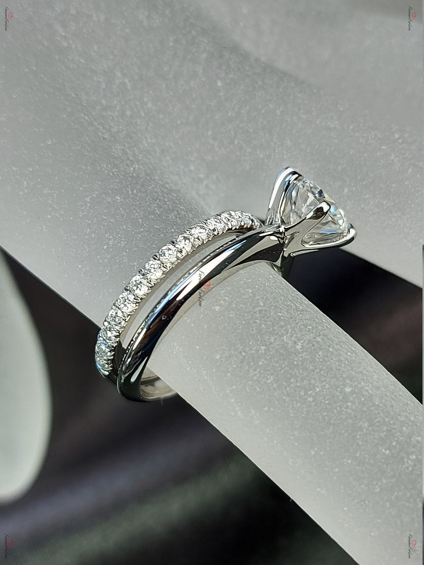Bague de fiançailles avec diamant rond certifié IGI de 1,2 carat Round cut Moissanite Taille Brillante engagement ring in Gold or Platinum — custom handcrafted by Forever For Love