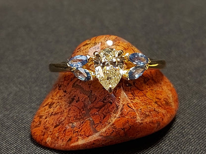 0.8 Ct GIA Certified Pear Diamond, Sapphire Engagement Ring