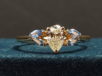 0.8 Ct GIA Certified Pear Diamond, Sapphire Engagement Ring