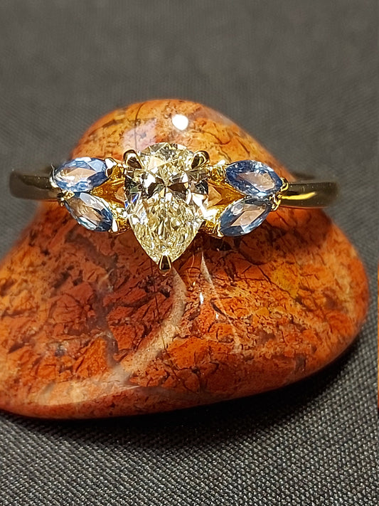 0.8 Ct GIA Certified Pear Diamond, Sapphire Engagement Ring