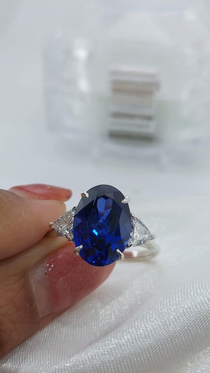 Oval Blue Diamond, Sapphire Halo Engagement Ring