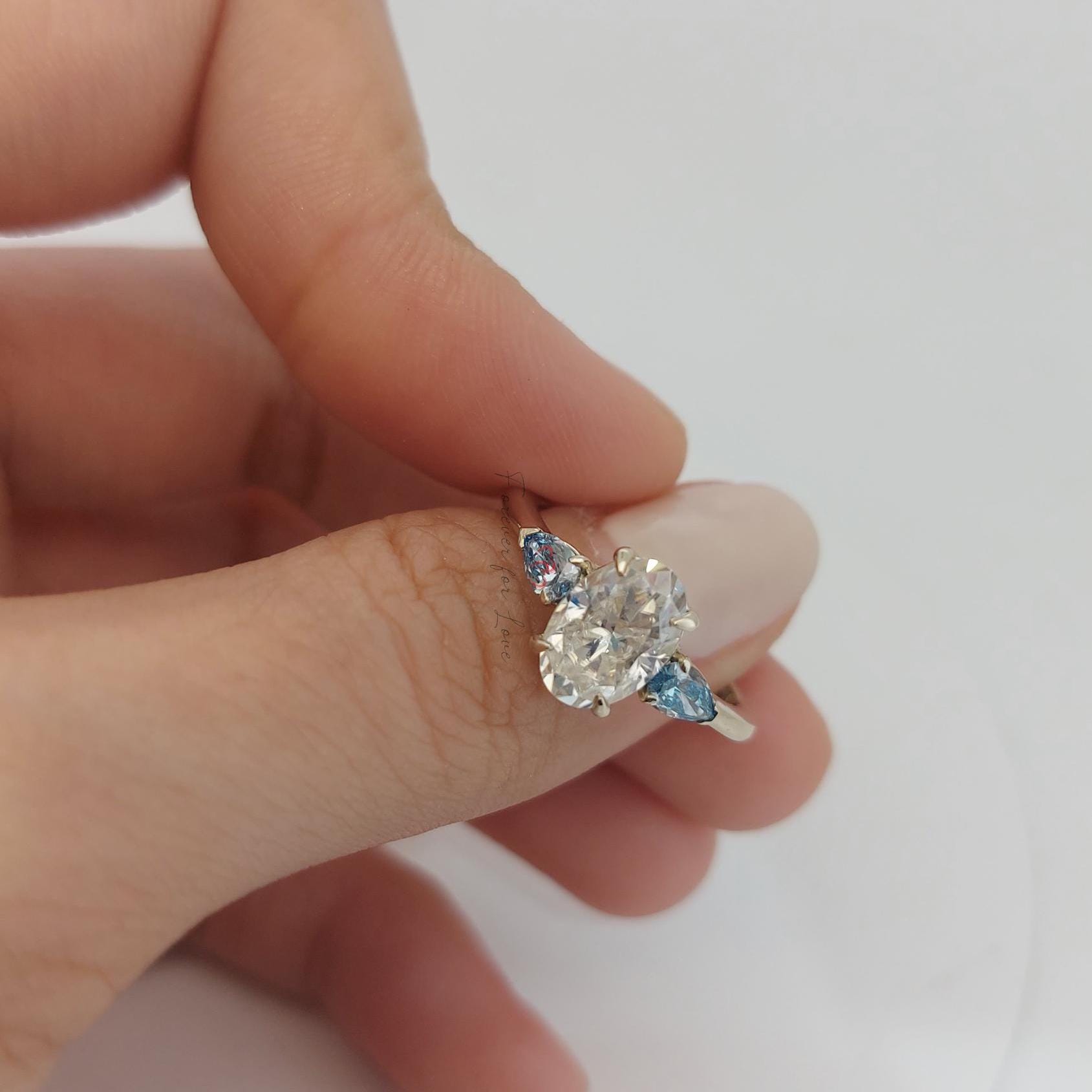 1.5 Ct Oval Diamond Three Stone Engagement Ring