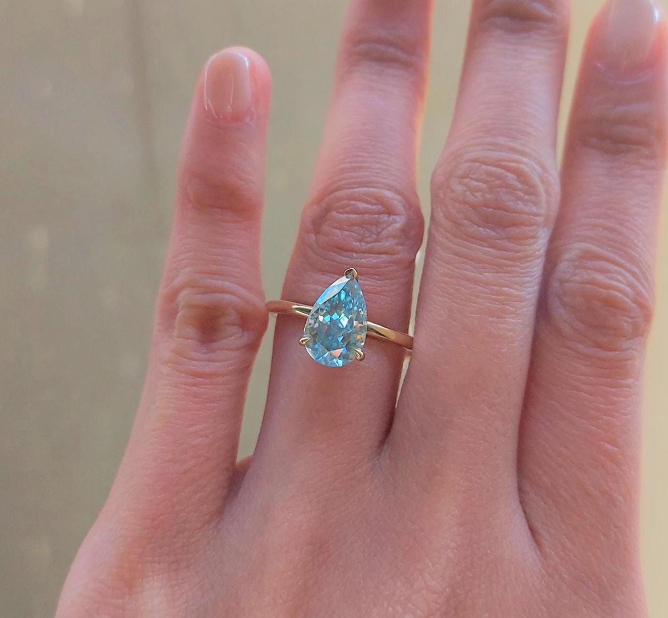 Bague de Fiançailles Éternité en Moissanite Poire de 2 Carats Pear cut 1Ct Moissanite taille brillant engagement ring in Gold or Platinum — custom handcrafted by Forever For Love