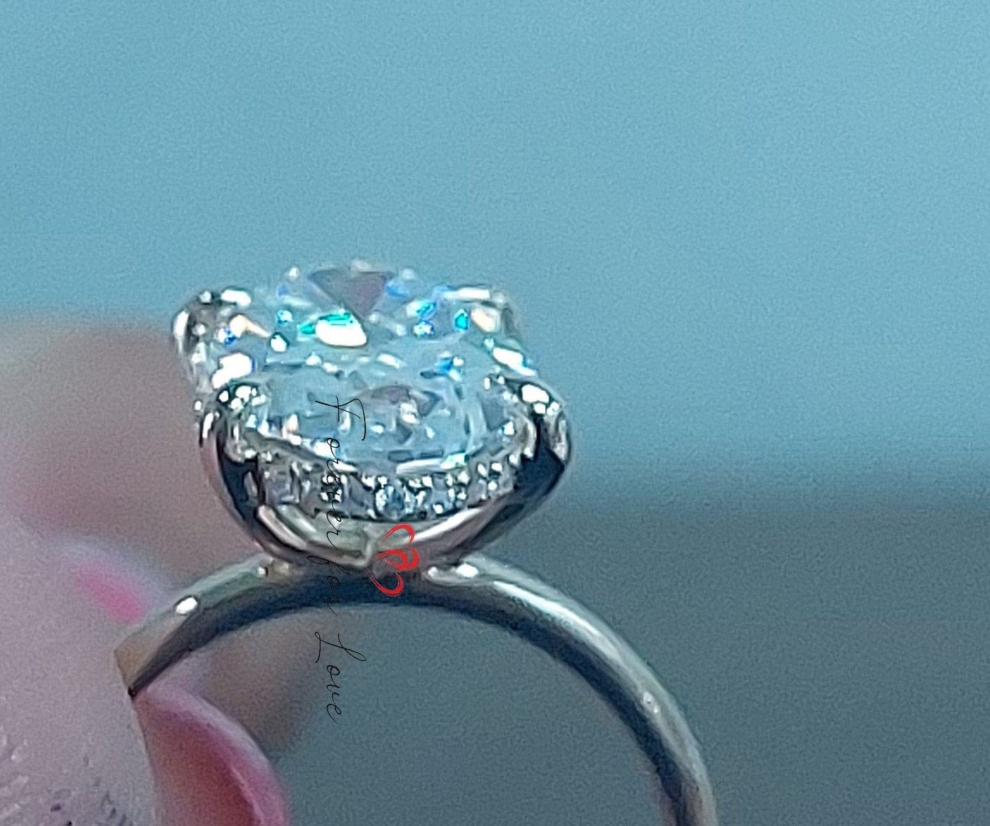 6 Ct Oval Hidden Halo Engagement Ring with Centre Carat Options Oval cut 1Ct Moissanite Brilliant Cut engagement ring in 935 Argentium Silver — custom handcrafted by Forever For Love
