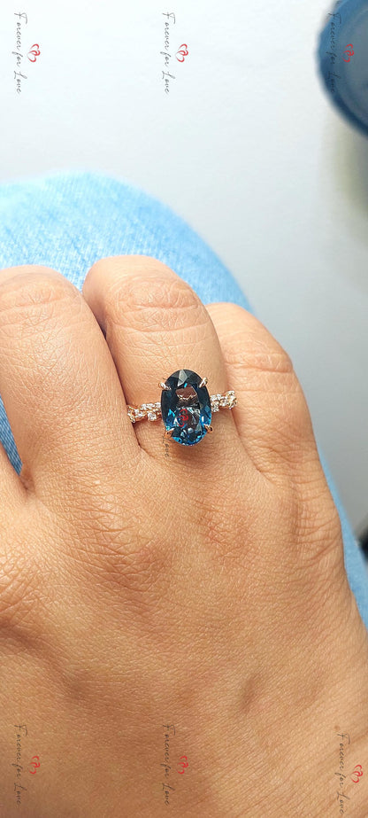 Oval Blue Diamond, Topaz Solitaire Ring