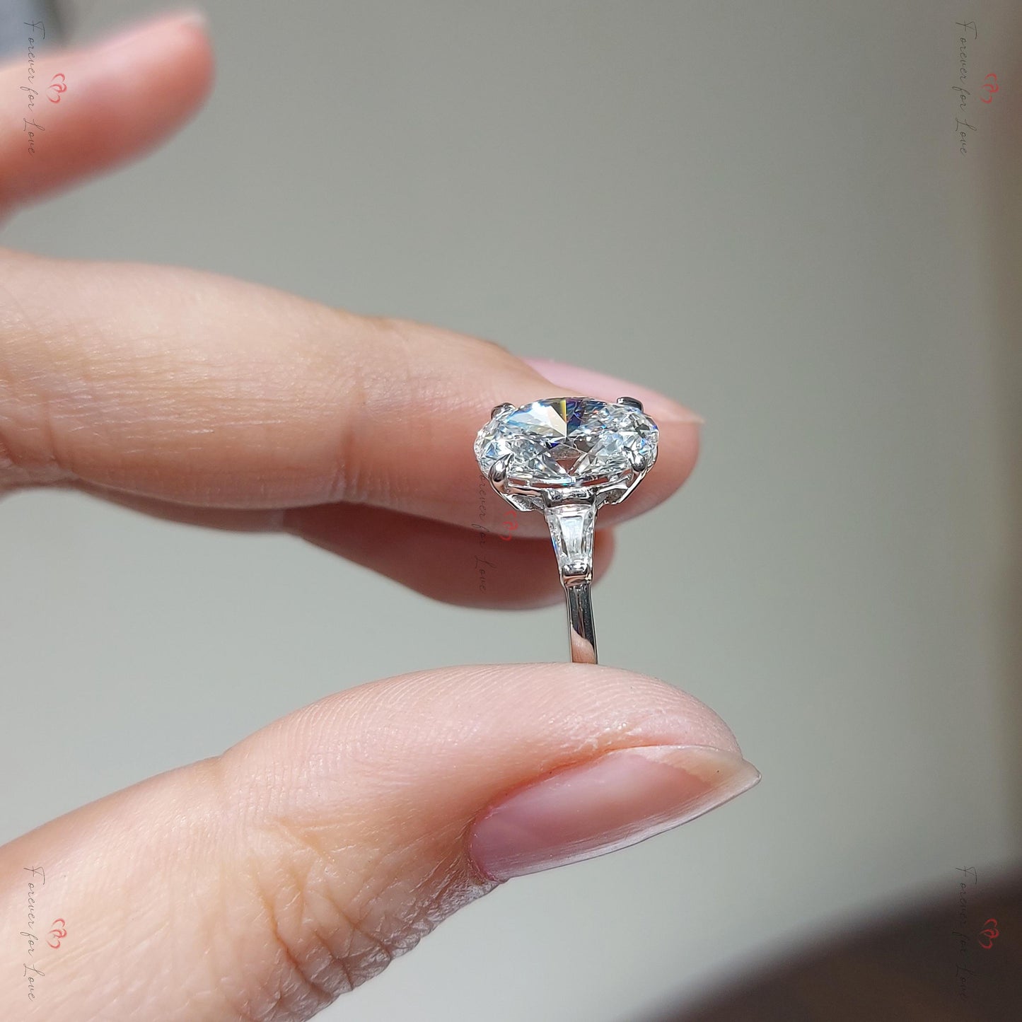 Bague de trois pierres en diamant ovale certifié IGI de 3 carats Oval cut Moissanite engagement ring in Gold or Platinum — custom handcrafted by Forever For Love