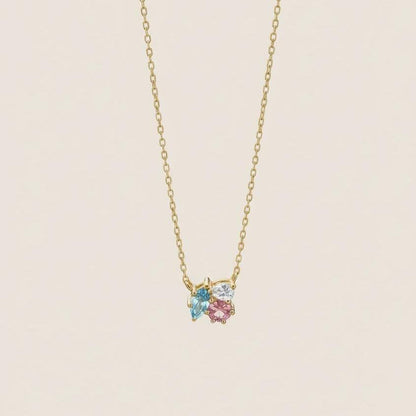 Mehrstein-Halskette handgefertigt mit blauem Topas, Turmalin und Diamant in massivem Gold und Silber. Besonderes Geschenk für sie.