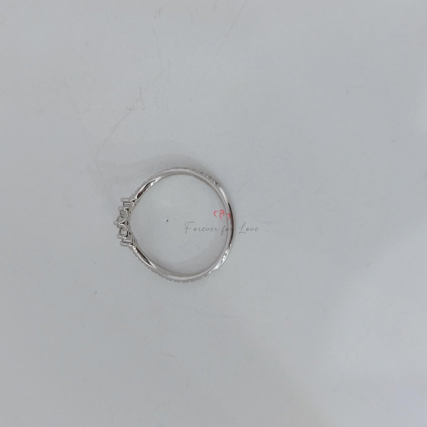 Bague empilable Courbe en diamant de laboratoire Round Lab Round cut Moissanite taille brillant engagement ring in Gold or Platinum — custom handcrafted by Forever For Love
