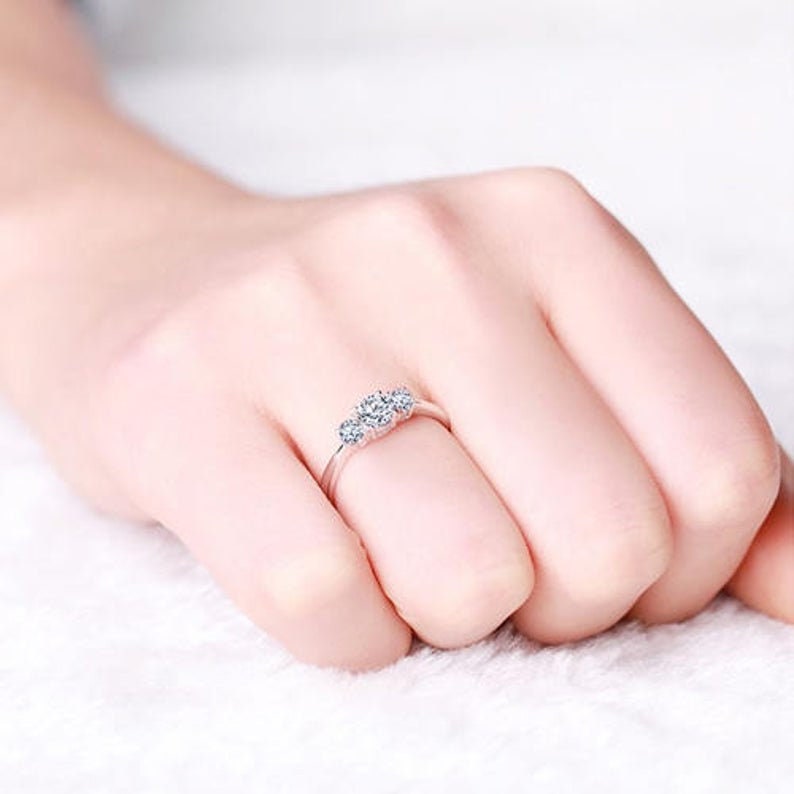 Round Diamond Three Stone Engagement Ring Round cut Moissanite engagement ring in Gold or Platinum — custom handcrafted by Forever For Love