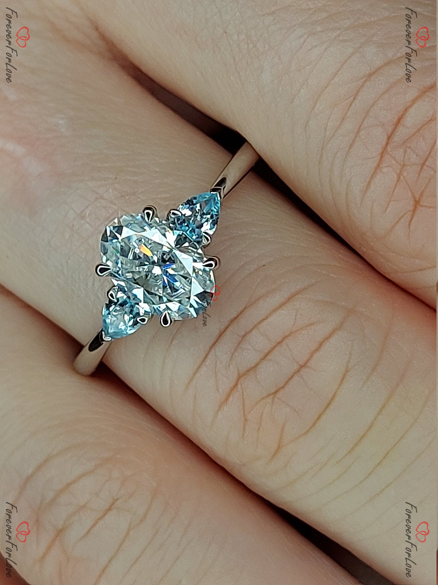 1.5 Ct Oval Moissanite Engagement Ring with Topaz Accents Oval cut 1Ct Moissanite Brilliant Cut engagement ring in 935 Argentium Silver — custom handcrafted by Forever For Love