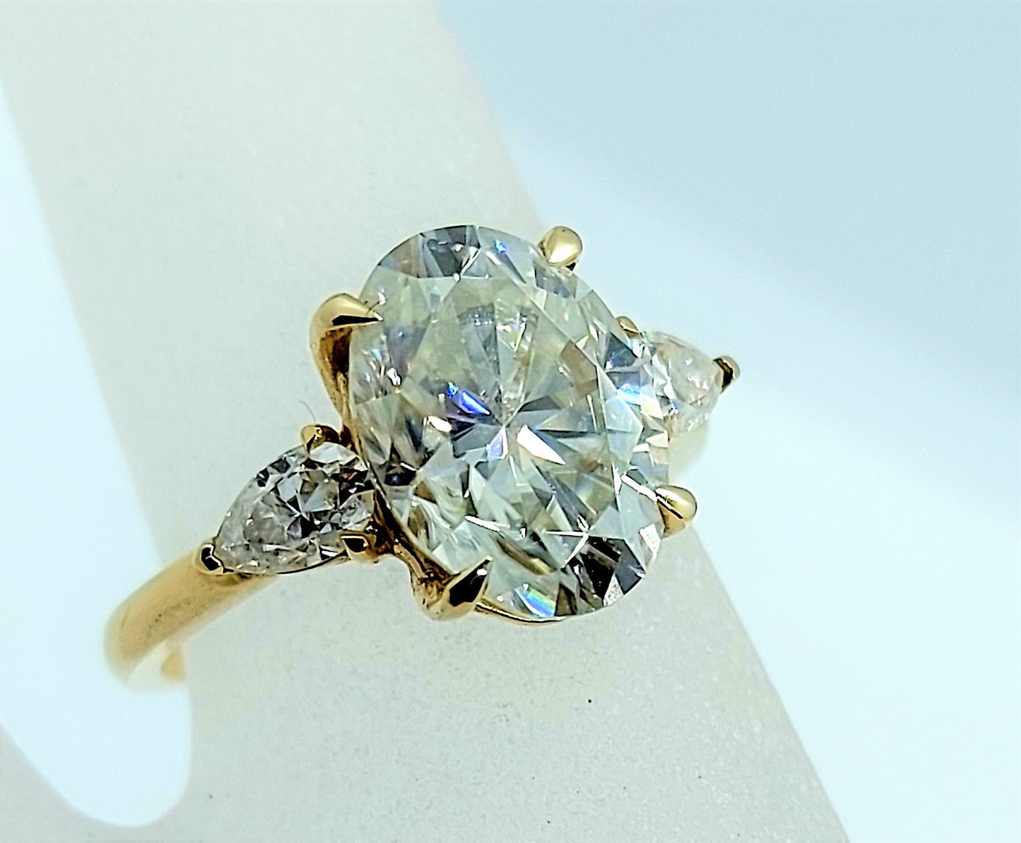 Bague de fiançailles trilogie ovale en moissanite de 3 carats Oval cut Moissanite engagement ring in Gold or Platinum — custom handcrafted by Forever For Love