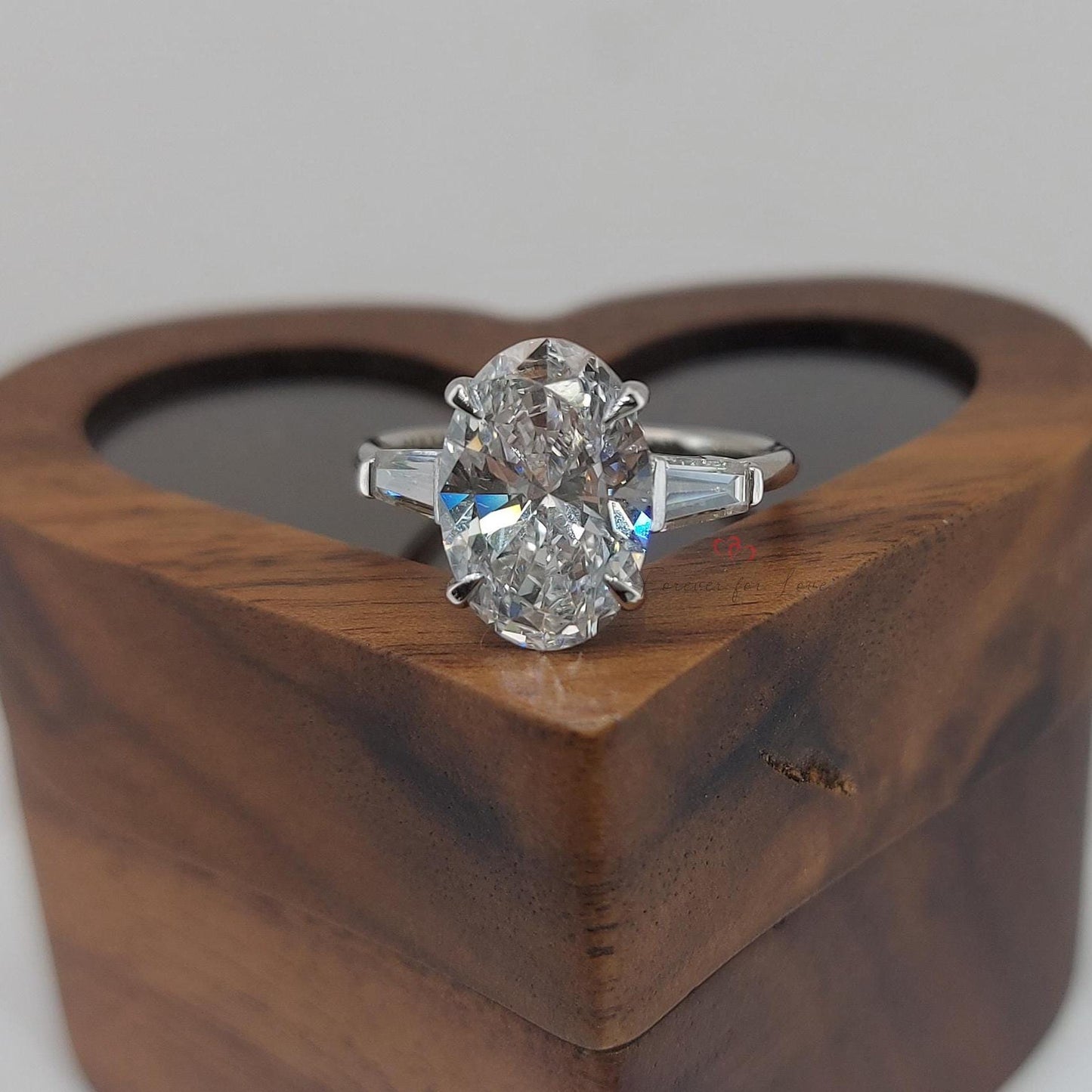 4 Ct IGI Certified Oval Lab Diamond Three Stone With Baguette Accents Ring Oval cut Moissanite engagement ring in Gold or Platinum — custom handcrafted by Forever For Love
