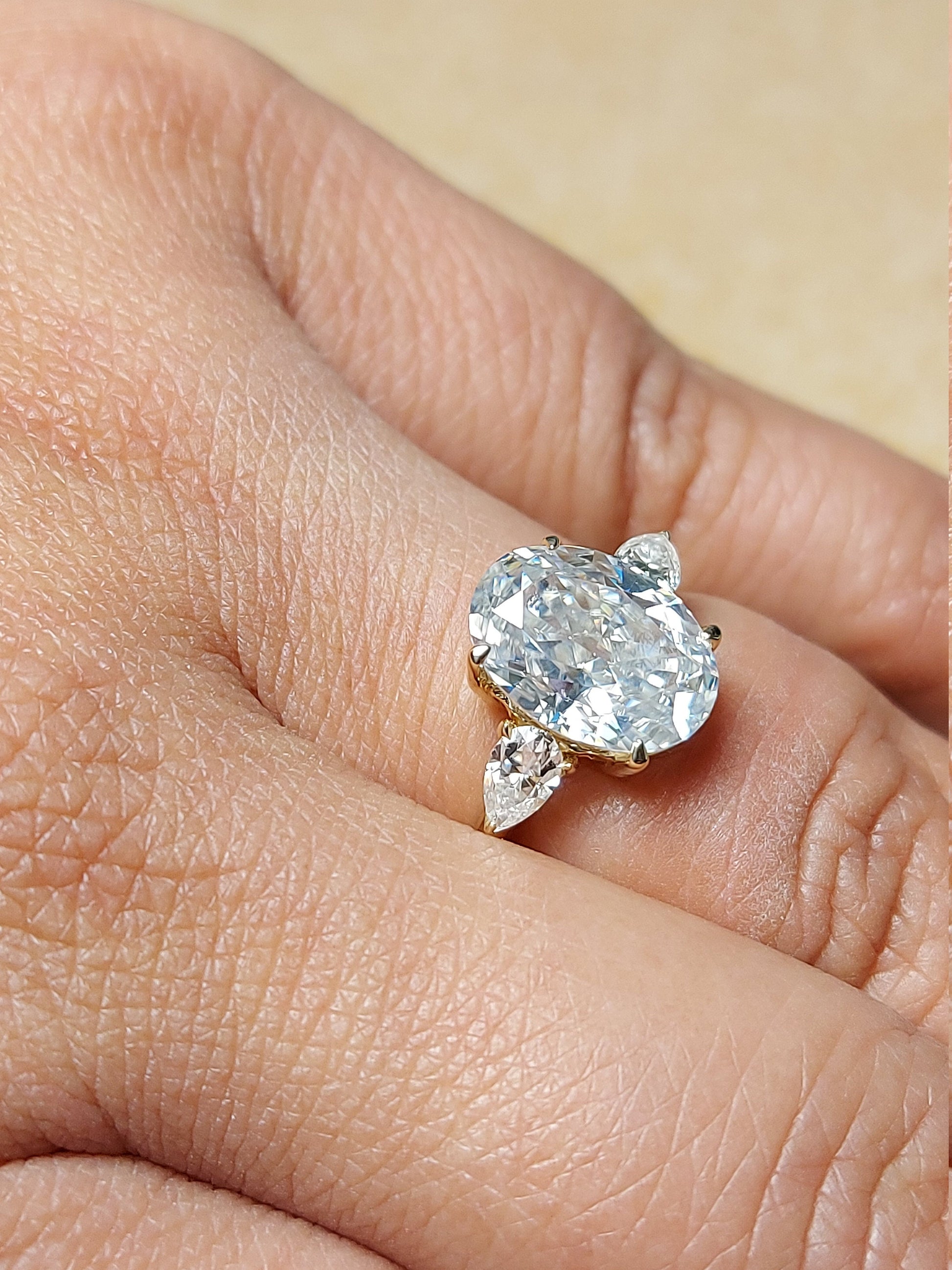 Oval Moissanite Three Stone Engagement Ring