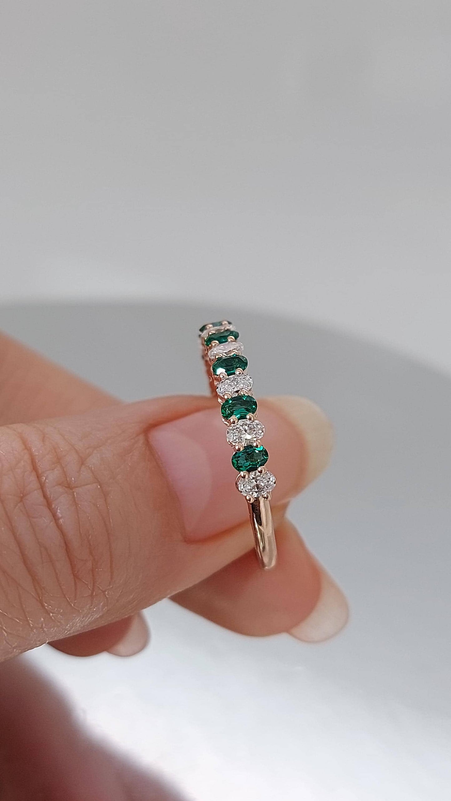 Bande de diamants ovales et émeraudes demi-éternité Oval cut Émeraude Naturelle engagement ring in Gold or Platinum — custom handcrafted by Forever For Love