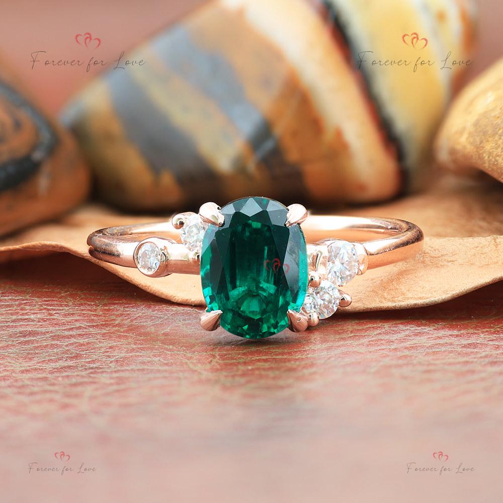 Bague de fiançailles ovale diamant et grappe d'émeraudes Oval cut Moissanite engagement ring in Gold or Platinum — custom handcrafted by Forever For Love