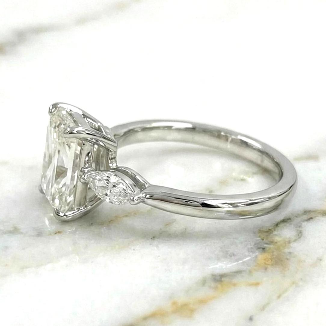 2.25 carat E/VVS2 IGI CERTIFIED Elongated Radiant Cut Lab Grown Diamond Three Stone Engagement Ring. Side Marquise Diamonds, 14k White Gold