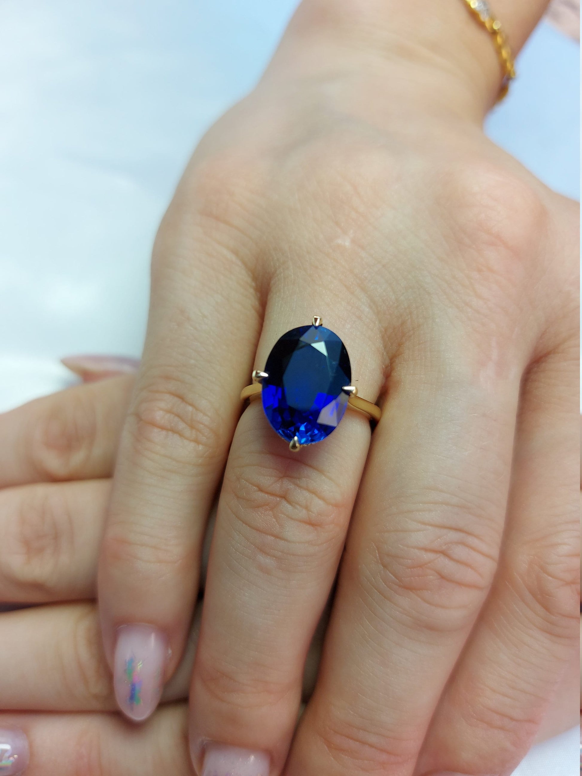 Oval Blue Diamond, Sapphire Hidden Halo Engagement Ring