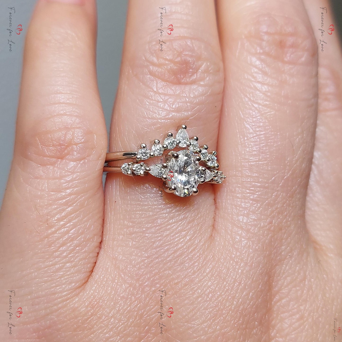 Parure de mariage délicate en moissanite ovale avec bague empilable Oval cut Moissanite taille brillant engagement ring in Gold or Platinum — custom handcrafted by Forever For Love