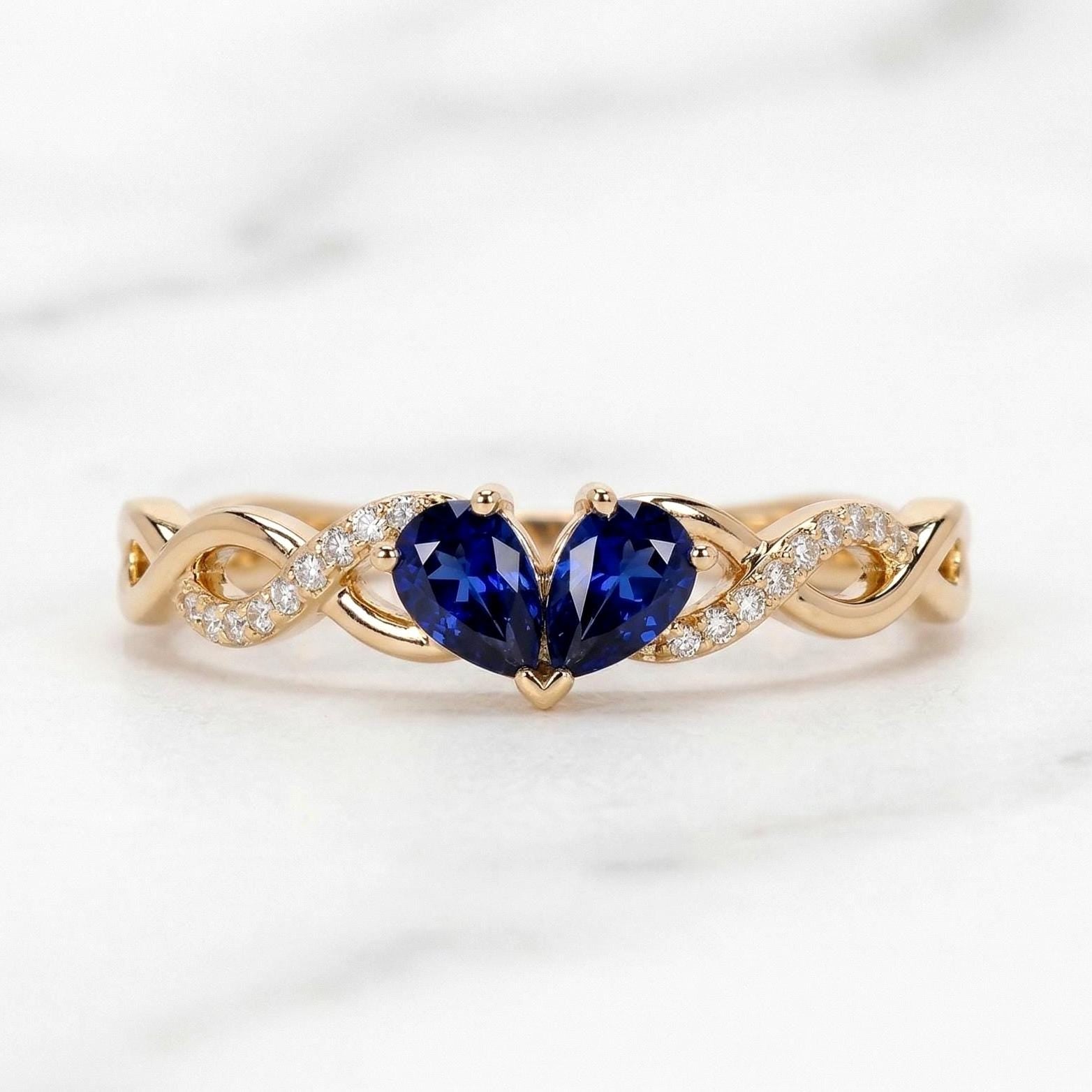 Pear Blue Sapphire Engagement Ring