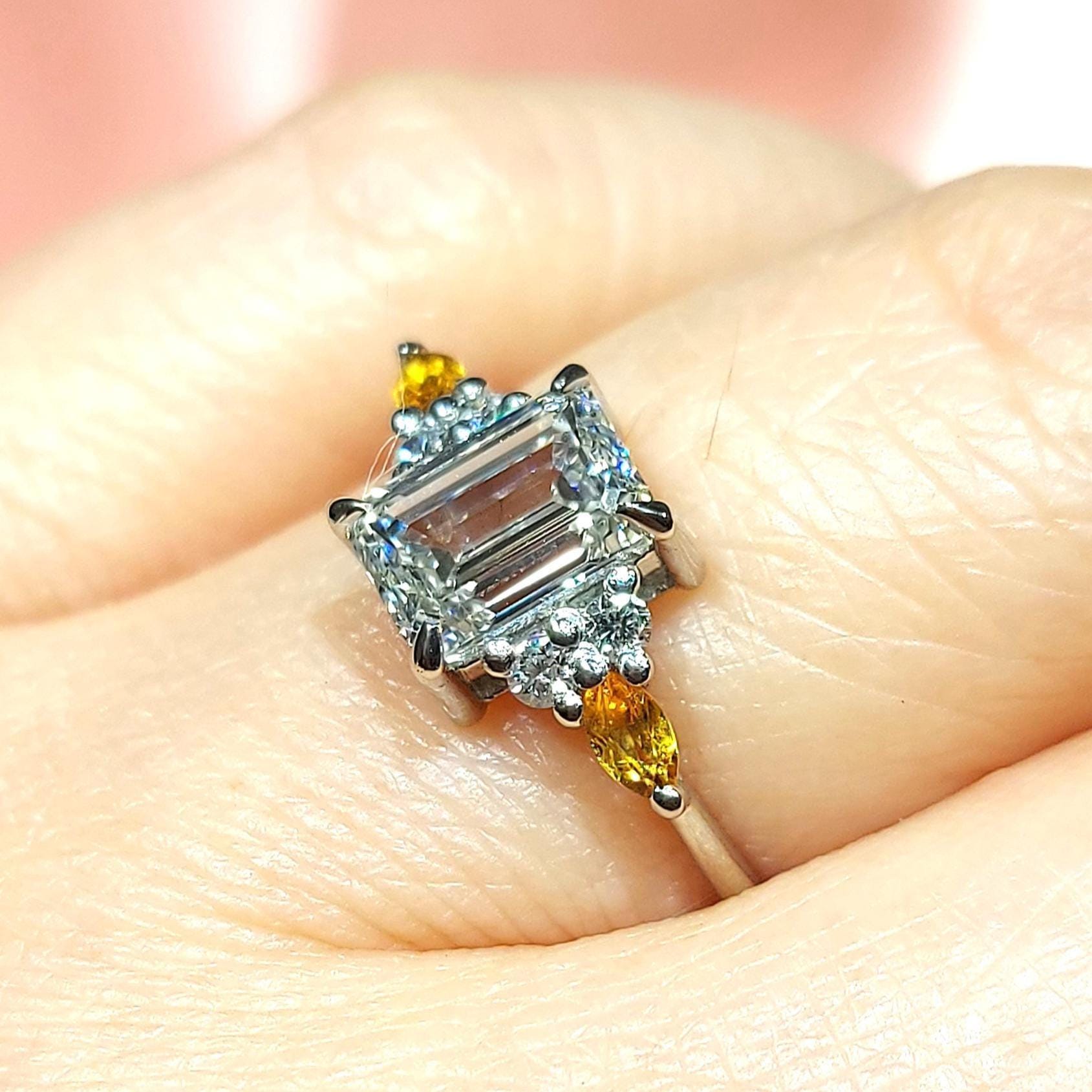 Emerald Diamond Three Stone Engagement Ring