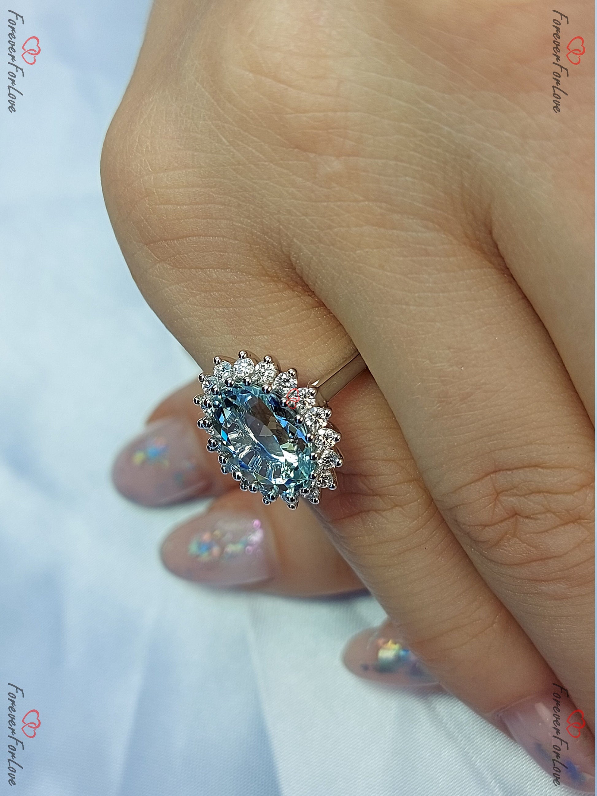Diamond, Aquamarine Halo Engagement Ring