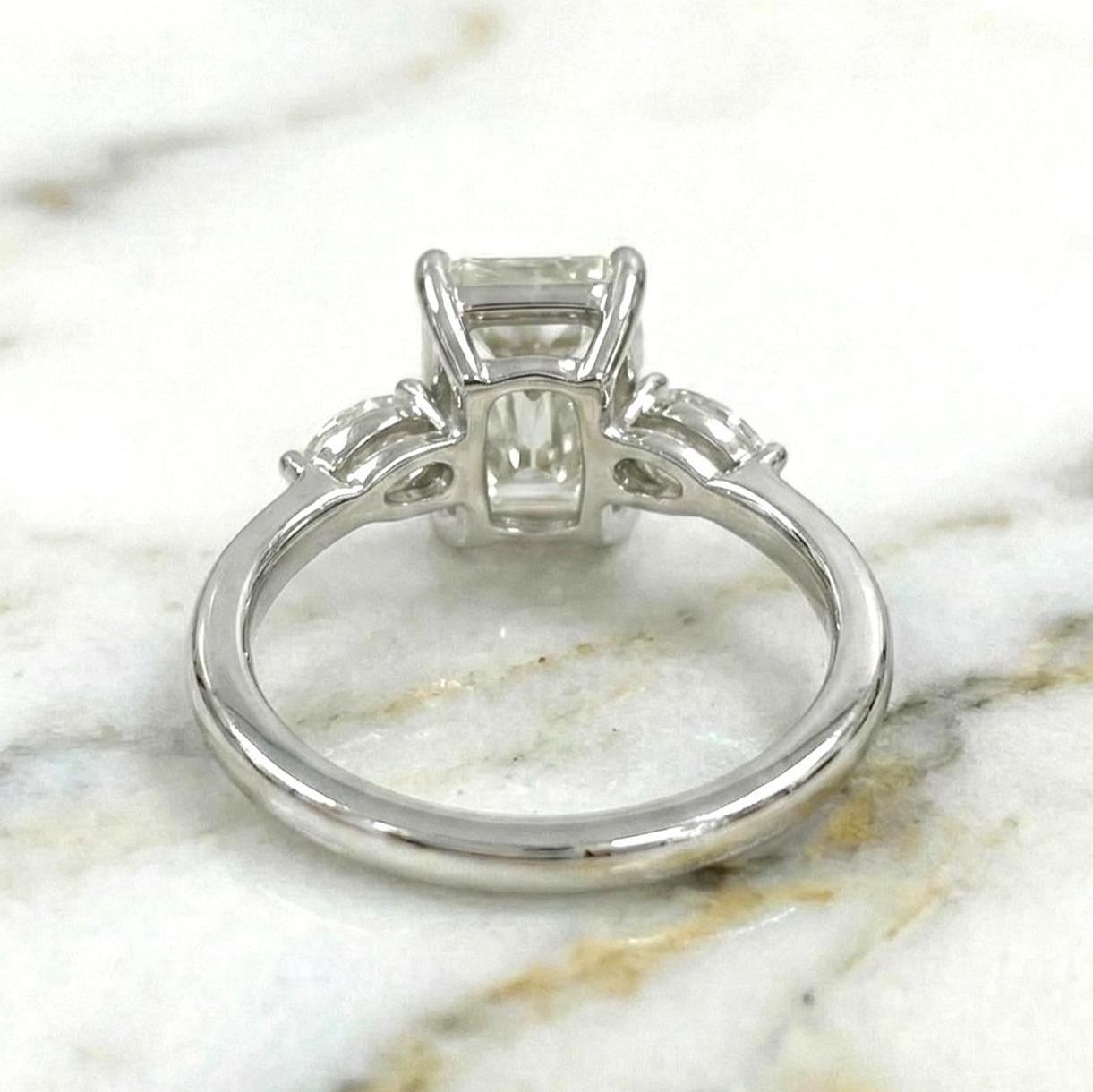2.25 carat E/VVS2 IGI CERTIFIED Elongated Radiant Cut Lab Grown Diamond Three Stone Engagement Ring. Side Marquise Diamonds, 14k White Gold