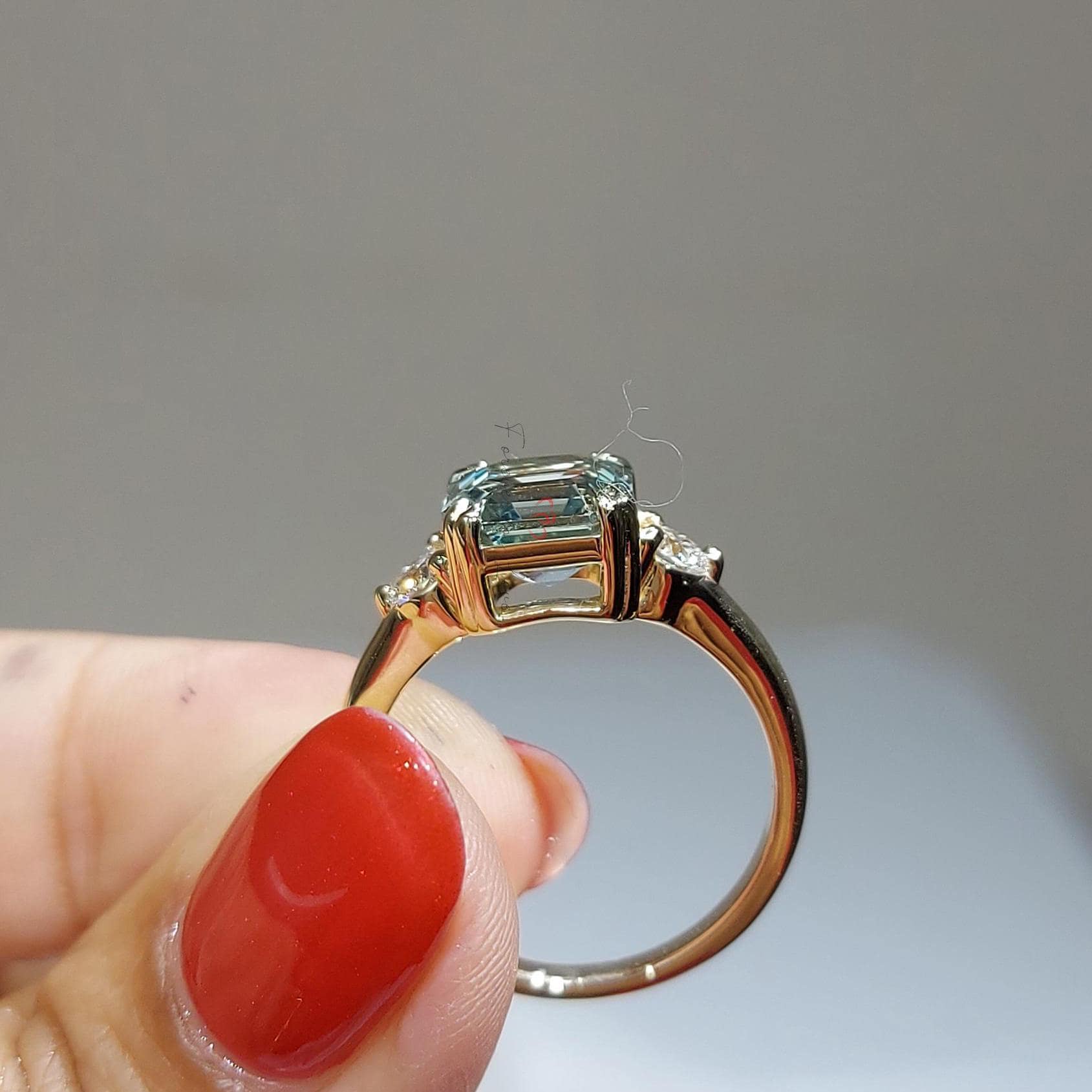 Green Sapphire Three Stone Engagement Ring