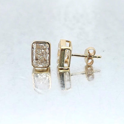 4 Carat Radiant Cut Bezel Setting Lab Grown Diamond Stud Earrings: 14K Yellow Gold, Perfect Gift for Her.