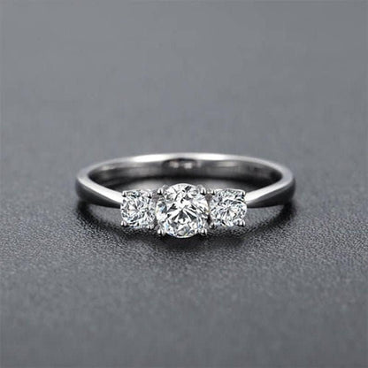 Round Diamond Three Stone Engagement Ring
