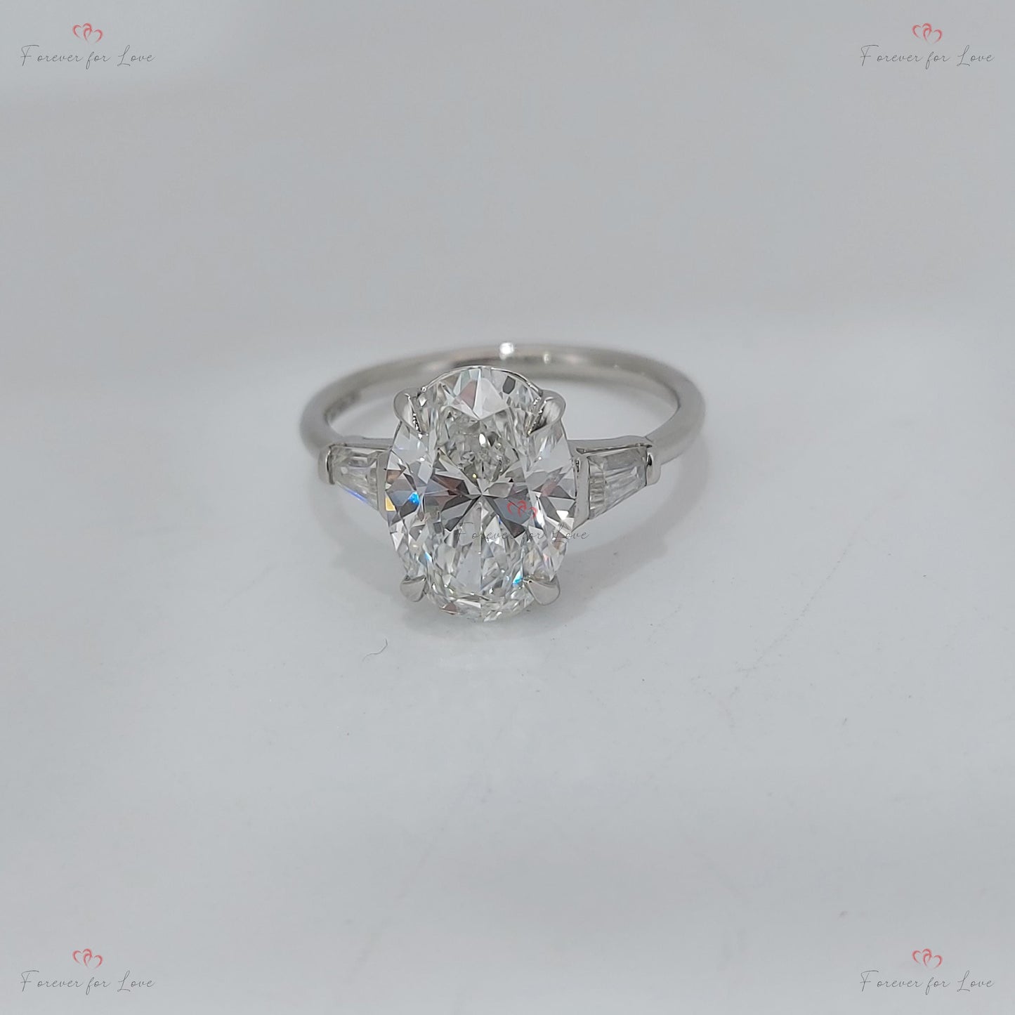 Bague de trois pierres en diamant ovale certifié IGI de 3 carats Oval cut Moissanite engagement ring in Gold or Platinum — custom handcrafted by Forever For Love