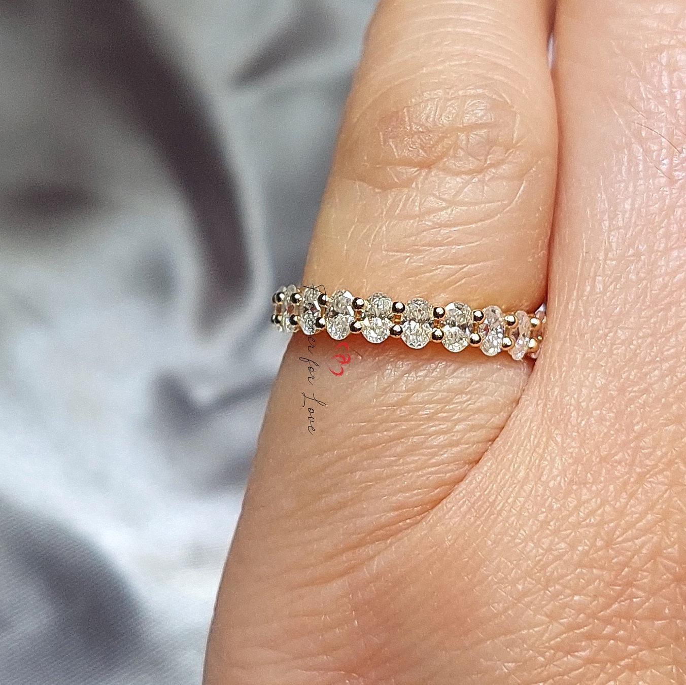 Alliance éternité complète avec diamants de laboratoire ovales Oval cut Moissanite taille brillant engagement ring in Gold or Platinum — custom handcrafted by Forever For Love