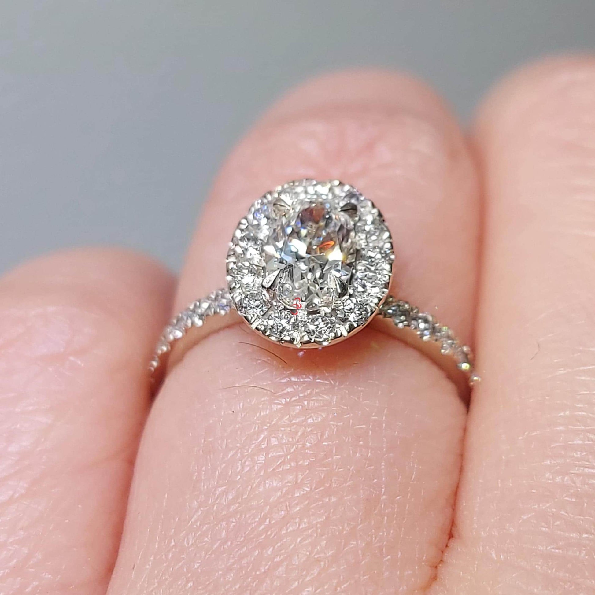 1.5 Ct Oval Diamond Halo Engagement Ring