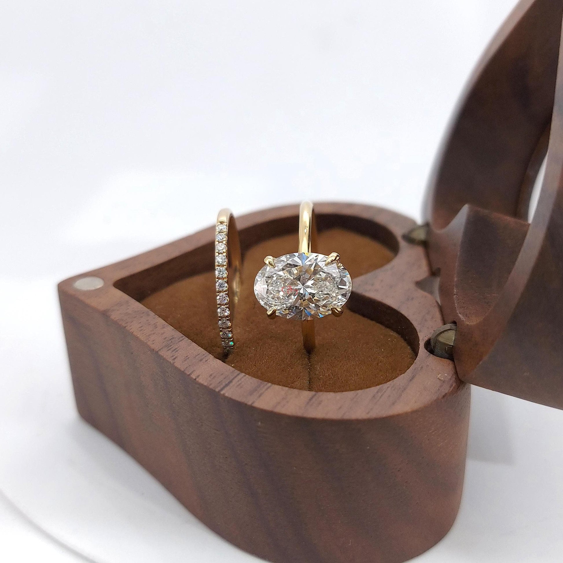 2.2 Carat Oval Cut Lab Grown Diamond Solitaire Engagement Ring & Matching Round Diamond Wedding Band, IGI Certified D/VVS2, 14K Yellow Gold.