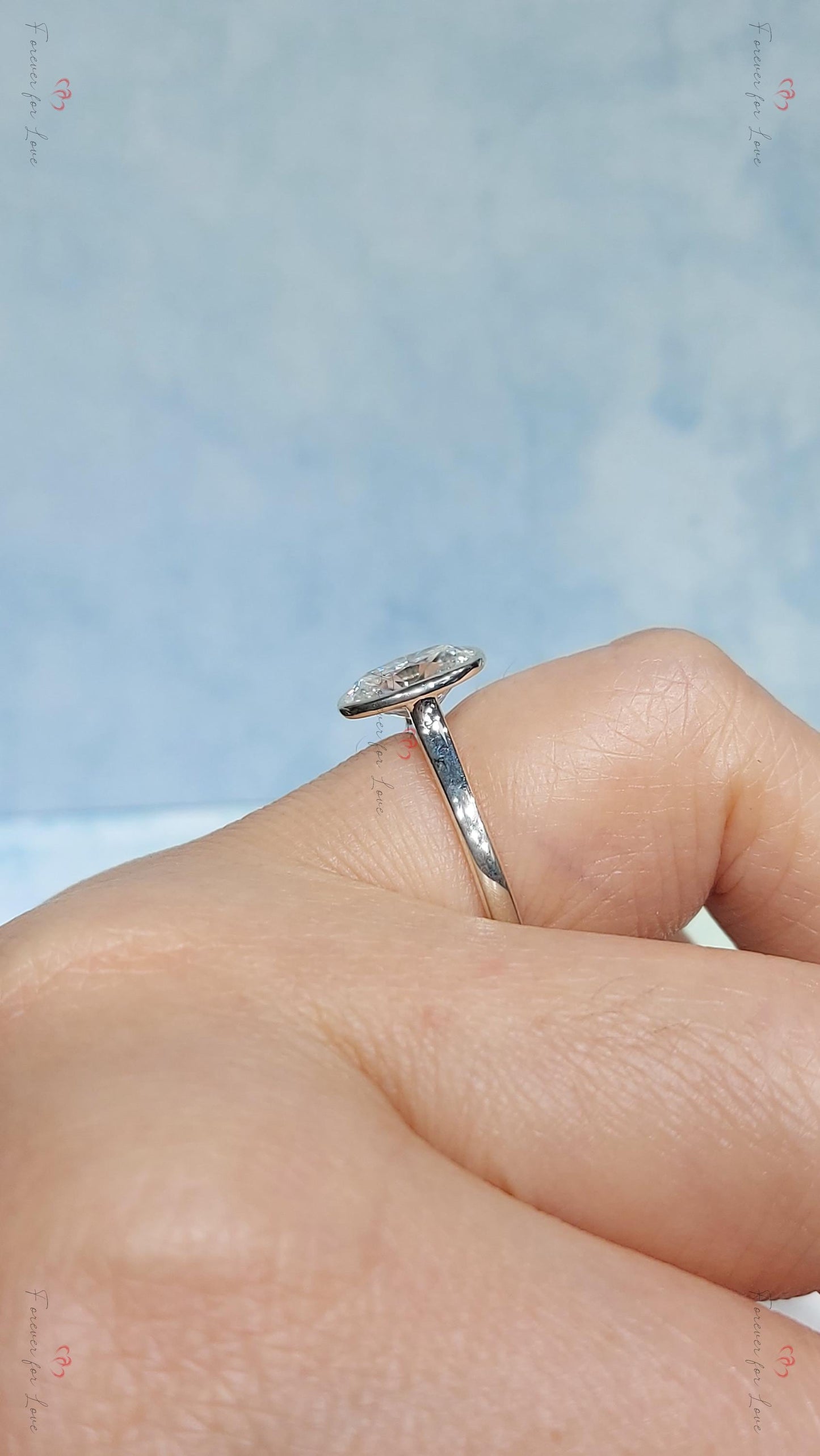 Bague de fiançailles solitaire ovale en moissanite Oval cut 1Ct Moissanite taille brillant engagement ring in Gold or Platinum — custom handcrafted by Forever For Love