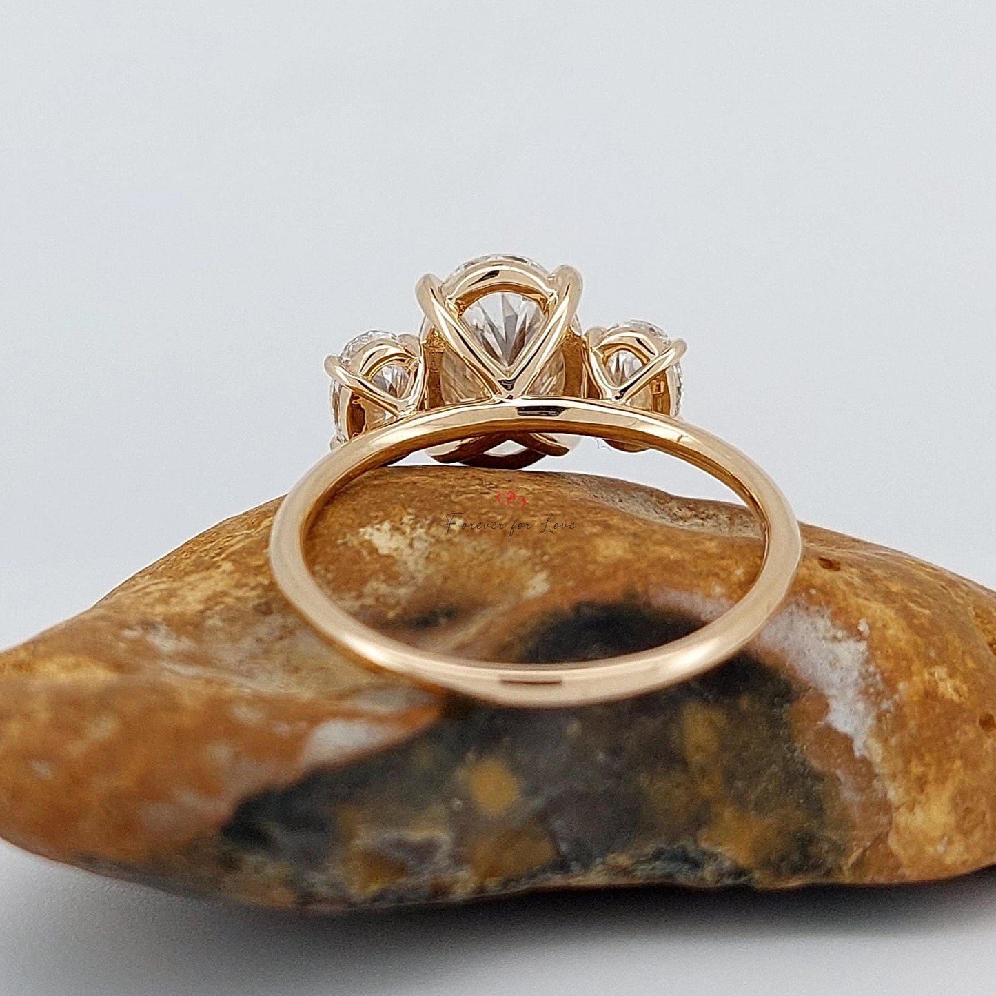 3 Ct Oval Diamond Three Stone Engagement Ring — E VVS2 Oval cut Moissanite engagement ring in Gold or Platinum — custom handcrafted by Forever For Love