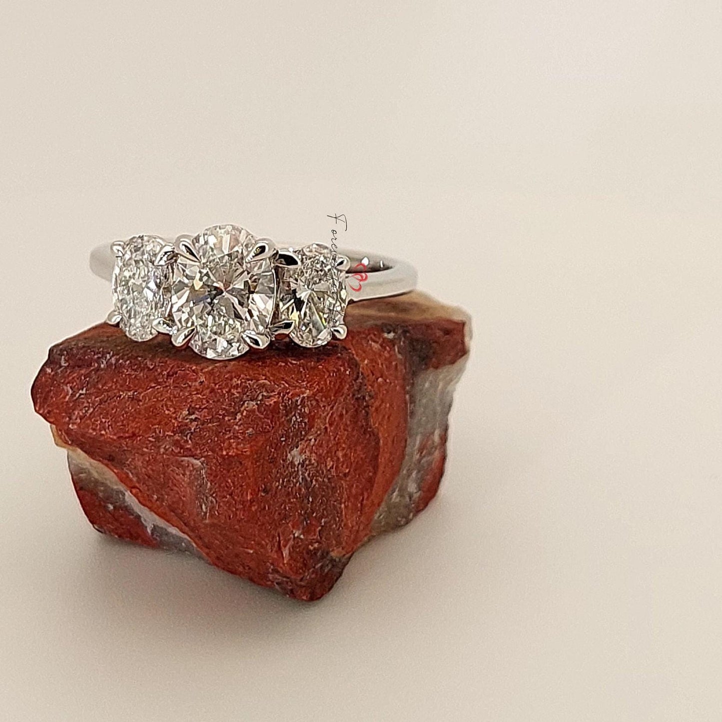 Bague trilogie ovale 2 Ct avec diamant certifié IGI Oval cut Moissanite engagement ring in Gold or Platinum — custom handcrafted by Forever For Love