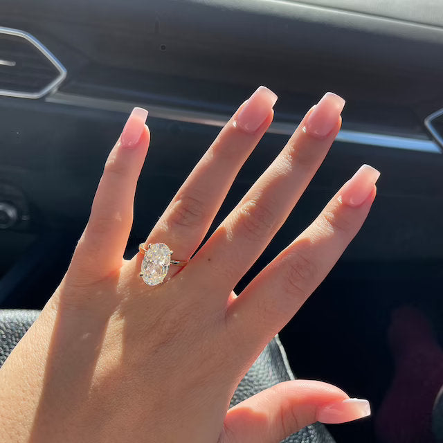 Bague de fiançailles solitaire ovale 7 carats en diamant et moissanite avec halo caché Oval cut 1Ct Moissanite taille brillant engagement ring in Gold or Platinum — custom handcrafted by Forever For Love