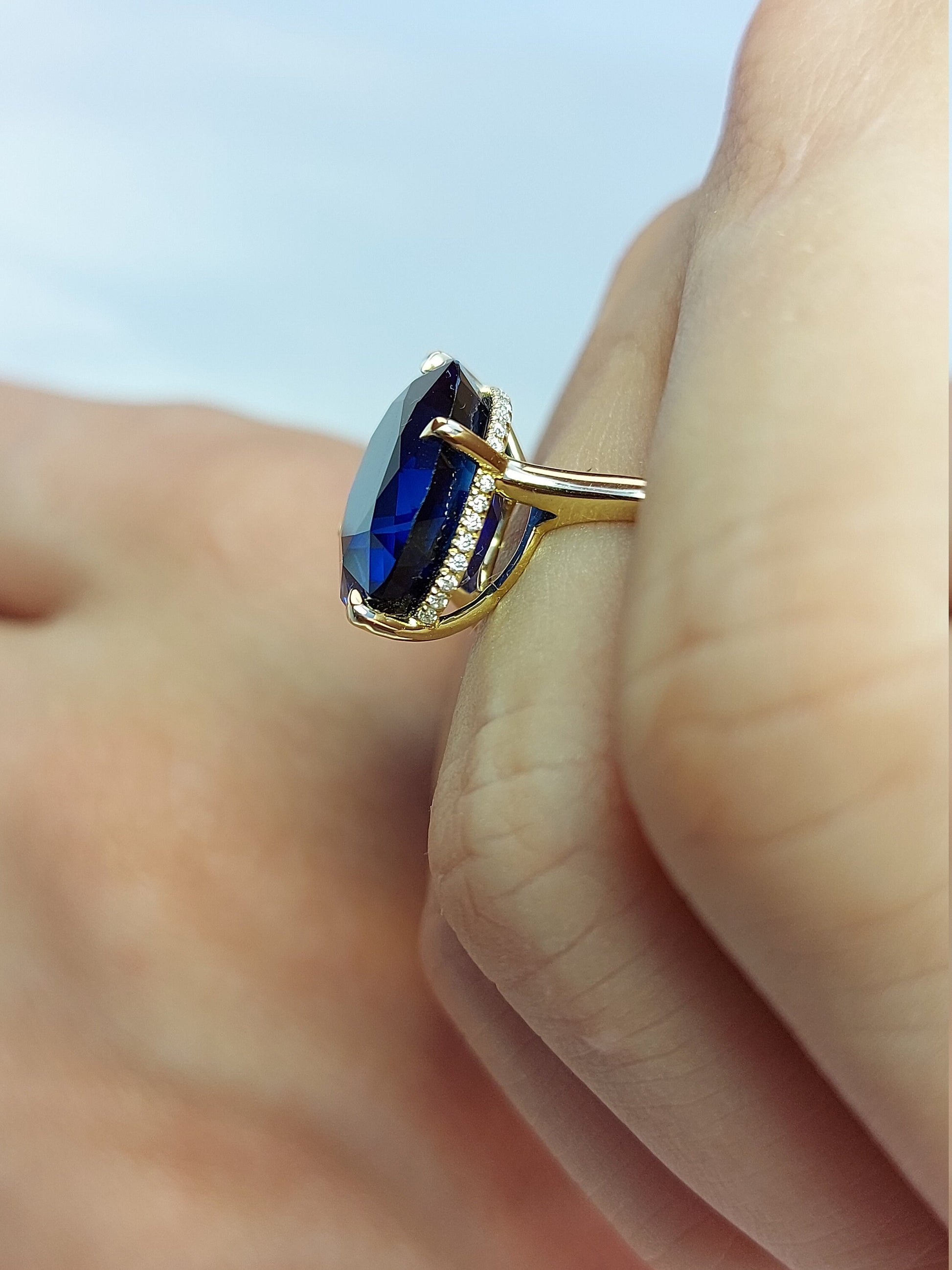 Oval Blue Diamond, Sapphire Hidden Halo Engagement Ring
