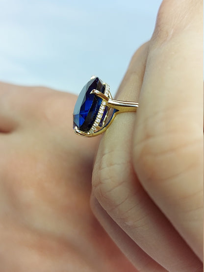 Oval Blue Diamond, Sapphire Hidden Halo Engagement Ring