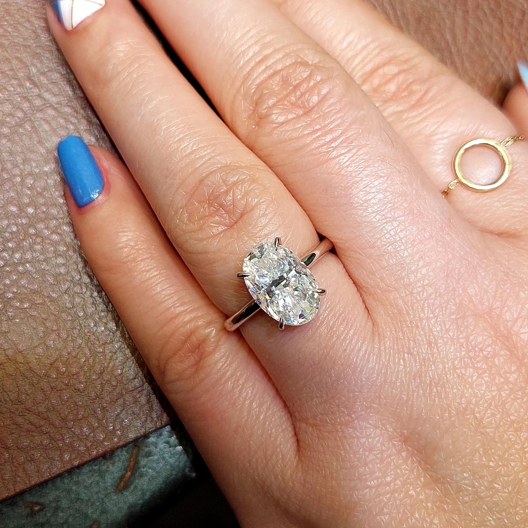 Oval Moissanite Halo Engagement Ring