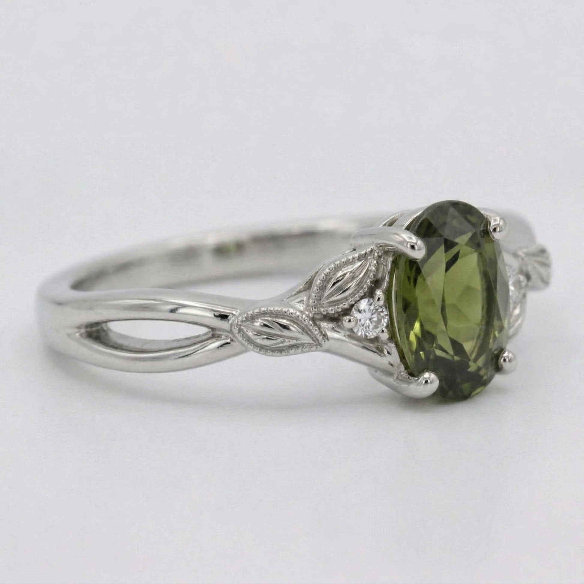 Oval Emerald Engagement Ring