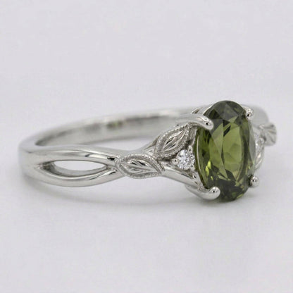 Oval Emerald Engagement Ring