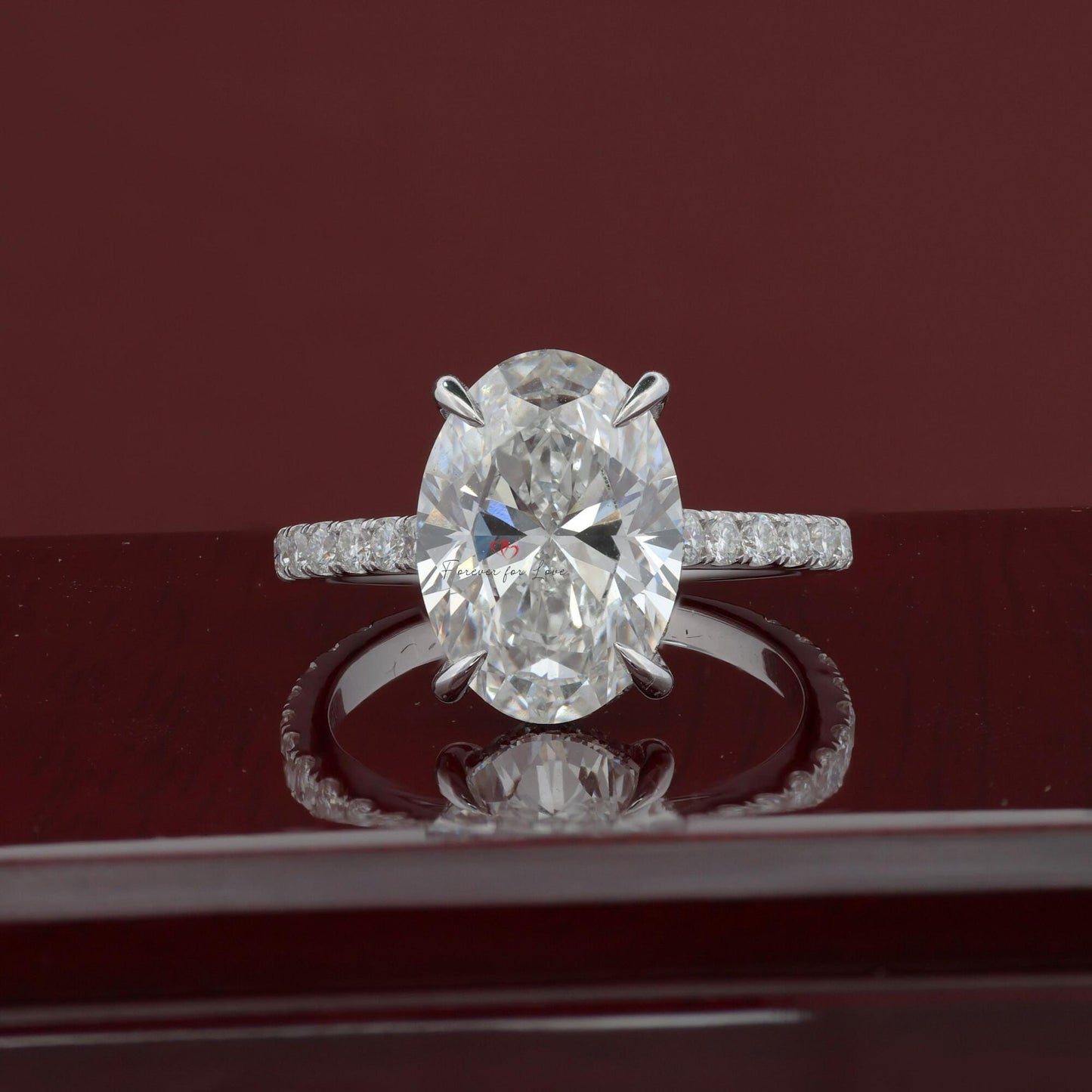 Solitaire en diamant de laboratoire ovale de 4 carats, D VVS2 1Ct Moissanite taille brillant engagement ring in Gold or Platinum — custom handcrafted by Forever For Love